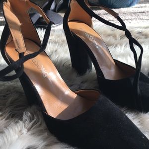 Black pointed toe lace up heels. Worn once. Size 5
